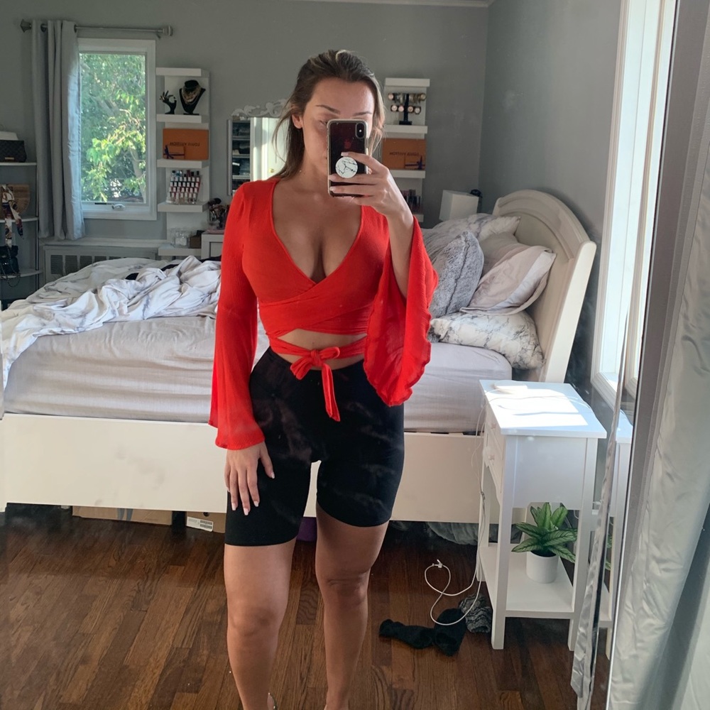 Red bell sleeve tie around crop top
